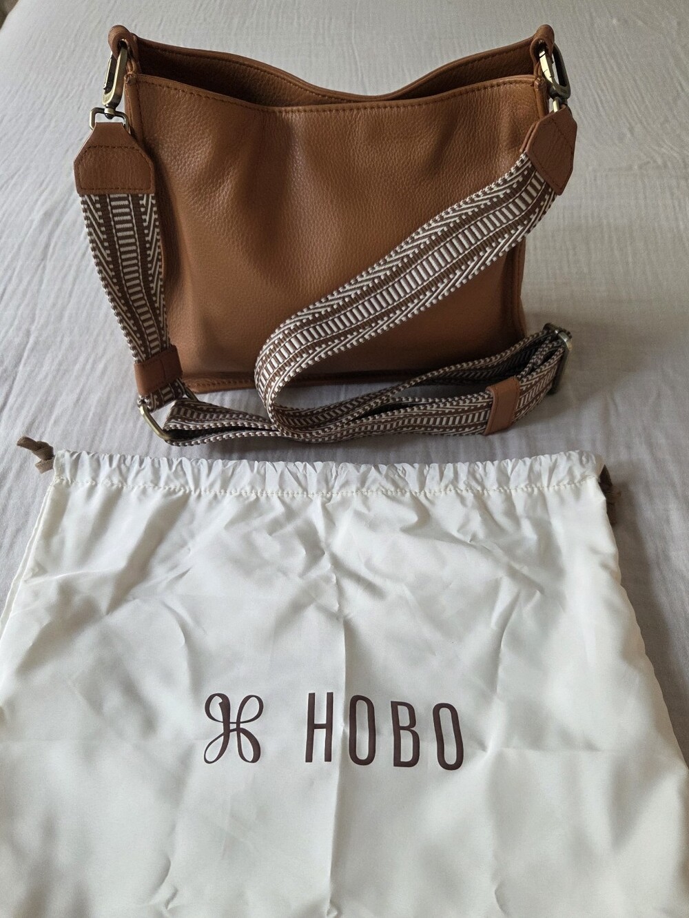 HOBO Crossbody In Cognac with Patterned Adjustable Strap